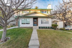 77 Strathcona Crescent SW Calgary, AB T3H 1K9