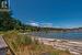 0.61 acre property boasts approx 150 feet of walk on ocean frontage