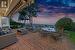 Relax on your Oceanside patio as the light leaves the Sky