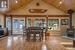 the home offers a beautiful Westcoast design & vaulted wood ceilings, French doors to back covered deck