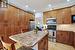 Great solid  custom wood cabinets in the kitchen- plenty of storage