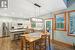 Open concept Kitchen/Dining room with access to the 665 sq.ft deck