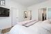 Master Bedroom with crown molding and hardwood / wood-style floors