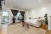 Living room with light hardwood / wood-style floors and crown molding