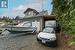 Triple garage + carport for RV or boat