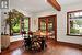 French Glass Doors open onto a Covered Patio