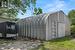 Quonset hut for garage or workshop or both.