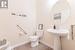 Main oversized level 1/2 bath powder room (large enough to convert to a FULL bath).