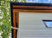 Clear cedar soffit detail. Custom Maibec wood siding.