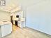 Kitchen featuring tasteful backsplash, sink, white cabinets, and appliances with stainless steel finishes