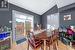 Dining room featuring lofted ceiling and light tile patterned flooring