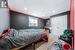 Bedroom featuring ornamental molding, a textured ceiling, and a closet