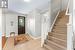 Tiled foyer entrance with a textured ceiling