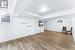 Basement featuring light hardwood / wood-style floors