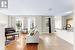 Living room featuring light hardwood / wood-style flooring and sink