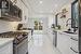 Kitchen featuring white cabinetry, appliances with stainless steel finishes, and sink