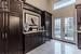 Doorway to outside featuring a towering ceiling and french doors