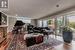 Living room featuring hardwood / wood-style floors and a textured ceiling