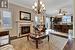 Living room featuring ornamental molding, hardwood / wood-style floors, and plenty of natural light