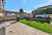 View of yard with a pergola, an outdoor fire pit, a patio, and a storage unit