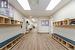 Mudroom with a paneled ceiling and hardwood / wood-style flooring