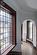 Light streams through the Leaded glass window at the landing ascending the stairs to the top 2 units.