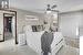 Bedroom featuring ceiling fan, light wood-type flooring, and a closet