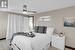 Bedroom featuring ceiling fan and light hardwood / wood-style floors