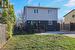 Back of house with a yard, a patio, and central AC unit