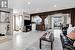 Living room with beam ceiling and light hardwood / wood-style flooring