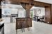 Kitchen with white cabinetry, dishwasher, a center island, sink, and a breakfast bar