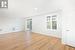 Empty room featuring crown molding and light hardwood / wood-style flooring