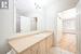 Bathroom featuring hardwood / wood-style floors and vanity