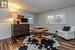 Sitting room featuring dark hardwood / wood-style floors and plenty of natural light