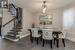 Dining area featuring a textured ceiling and dark hardwood / wood-style floors