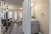 Foyer with a textured ceiling, dark hardwood / wood-style flooring, and sink