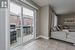 Doorway featuring light tile patterned floors