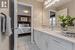 Bathroom with tile patterned floors and vanity