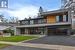 Contemporary house with a garage and a front lawn