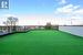 1200sq ft Rooftop artificial turf with glass railing