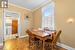 Dining room featuring ornamental molding and washing machine and clothes dryer