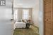 Carpeted bedroom featuring a textured ceiling