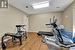 Exercise room featuring light hardwood / wood-style flooring