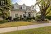 Cape cod-style house featuring a front yard