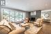 Living room featuring dark hardwood / wood-style flooring