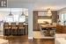 Dining space with sink, hardwood / wood-style floors, and a chandelier