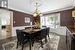 Dining Room with hardwood floors and wainscotting