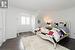 Bedroom featuring hardwood flooring