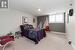 Lower level bedroom with walk-in closet and bright window