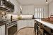 Revamped Kitchen with State-Of-The-Art Stainless Steel Appliances
